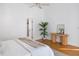 Bright bedroom features hardwood floors, large plant, and modern-style decor at 669 Palisades Dr, Mount Pleasant, SC 29464