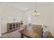 Inviting dining room featuring a rustic wood table, upholstered chairs and an ornate buffet at 871 Center Park St, Charleston, SC 29492