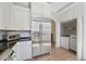 Well-equipped kitchen with stainless refrigerator and easy access to a laundry room at 871 Center Park St, Charleston, SC 29492