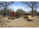 Community playground featuring a train-themed play structure and ample space for children to explore and enjoy outdoor activities at 871 Center Park St, Charleston, SC 29492