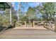 Large wooden back deck with wood railing overlooking the back yard at 905 Battery Way, Mount Pleasant, SC 29464