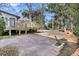 Outdoor patio with a wooden deck and landscaped backyard, perfect for entertaining at 905 Battery Way, Mount Pleasant, SC 29464