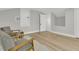 Bedroom with hardwood floors and chairs, showcasing a cozy space with a sloped ceiling at 905 Battery Way, Mount Pleasant, SC 29464