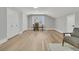 Large bedroom area with hardwood floors, two closets, two doors, and a sitting area at 905 Battery Way, Mount Pleasant, SC 29464