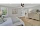 Comfortable bedroom features light gray walls, light-colored furniture, and sun-filled windows at 905 Battery Way, Mount Pleasant, SC 29464