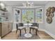 Breakfast nook area with table and seating by bay window at 905 Battery Way, Mount Pleasant, SC 29464