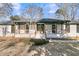 Charming single-story home featuring a welcoming front porch and classic design elements at 905 Battery Way, Mount Pleasant, SC 29464