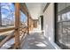 Covered front porch showcasing stylish wood railings and providing a shaded outdoor space at 905 Battery Way, Mount Pleasant, SC 29464