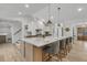 Elegant kitchen with a spacious island, pendant lighting, and modern appliances at 905 Battery Way, Mount Pleasant, SC 29464