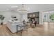Bright and airy living room featuring a fireplace, vaulted ceiling, and hardwood floors at 905 Battery Way, Mount Pleasant, SC 29464