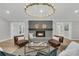 Bright living room featuring a fireplace, wood mantel, and contemporary decor at 905 Battery Way, Mount Pleasant, SC 29464