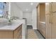 Mud room with gray tile floors, built-in storage, and a convenient dog shower at 905 Battery Way, Mount Pleasant, SC 29464