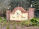 Community entrance sign reads 