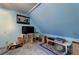 Attic room with record player, vinyl collection, and comfortable pet bed at 960 Mooring Dr, Charleston, SC 29412