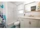 Bright bathroom with a white vanity, updated fixtures, and blue accent tile at 960 Mooring Dr, Charleston, SC 29412