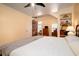 Bright bedroom featuring hardwood floors, a ceiling fan, and a built-in shelves at 960 Mooring Dr, Charleston, SC 29412