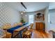Charming dining area featuring pendant lighting, hardwood floors, and stylish decor at 960 Mooring Dr, Charleston, SC 29412
