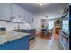 Modern kitchen featuring stainless steel appliances, updated cabinetry, and an adjacent dining area at 960 Mooring Dr, Charleston, SC 29412
