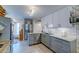 Updated kitchen featuring gray cabinetry, granite countertops, subway tile backsplash, and stainless steel appliances at 960 Mooring Dr, Charleston, SC 29412
