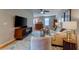 Cozy living room with stylish furniture, a large television, and hardwood floors at 960 Mooring Dr, Charleston, SC 29412