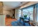 Bright sunroom with large windows, fireplace, and hardwood floors; perfect for relaxing or entertaining at 960 Mooring Dr, Charleston, SC 29412