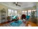 Bright and airy sunroom with ample natural light, comfortable seating, and stylish decor at 960 Mooring Dr, Charleston, SC 29412