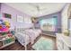 This bedroom features a white bedframe and lots of natural light at 103 Old Tree Rd, Goose Creek, SC 29445