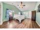 Spacious bedroom with a vaulted ceiling, wood floors, natural light and a ceiling fan at 103 Old Tree Rd, Goose Creek, SC 29445