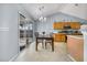 Bright dining area adjacent to the kitchen with sliding glass doors, perfect for Gathering meals and gatherings at 103 Old Tree Rd, Goose Creek, SC 29445
