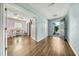 Inviting foyer with hard wood floors, leading to a living space, and views of the front yard at 103 Old Tree Rd, Goose Creek, SC 29445