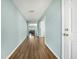 Entryway with hard wood floors flowing into an open floor plan, providing a bright and welcoming space at 103 Old Tree Rd, Goose Creek, SC 29445