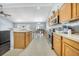 Bright eat-in kitchen featuring stainless steel appliances, wood cabinets, and plenty of counter space at 103 Old Tree Rd, Goose Creek, SC 29445