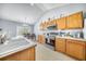 Well-equipped kitchen with stainless steel appliances, abundant cabinet space, and a view to the dining area at 103 Old Tree Rd, Goose Creek, SC 29445
