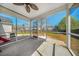 View of the screened patio and backyard at 103 Old Tree Rd, Goose Creek, SC 29445