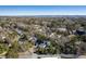 Aerial view of a charming neighborhood, surrounded by lush greenery and mature trees at 103 Tall Oak Ave, Charleston, SC 29407