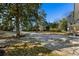 Large backyard with a hammock and a concrete patio perfect for entertaining at 103 Tall Oak Ave, Charleston, SC 29407