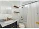 Beautiful bathroom with stylish fixtures, floating shelves, and white subway tiles at 103 Tall Oak Ave, Charleston, SC 29407