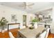Bright dining room with hardwood floors, modern table, and an open layout at 103 Tall Oak Ave, Charleston, SC 29407
