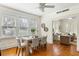 Bright dining room with hardwood floors, modern table, and an open layout at 103 Tall Oak Ave, Charleston, SC 29407