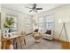 Bright living room featuring neutral-toned decor, hardwood floors, and lots of light at 103 Tall Oak Ave, Charleston, SC 29407