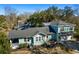 Inviting home with a spacious deck and covered porch, perfect for enjoying the backyard view at 103 Tall Oak Ave, Charleston, SC 29407