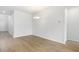Open dining area with hardwood floors and a modern chandelier at 1041 Swamp Rose Run, Summerville, SC 29485