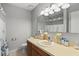 Neutral bathroom featuring a large mirror, vanity and a toilet at 105 Gatewood St, North Charleston, SC 29418