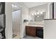 En-suite bathroom featuring a vanity and shower with patterned curtain at 105 Gatewood St, North Charleston, SC 29418