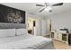 Bedroom with a gray bed, ceiling fan and a view of the en-suite bathroom at 105 Gatewood St, North Charleston, SC 29418