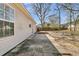 View of the backyard featuring a concrete and brick paver patio, perfect for outdoor entertaining at 106 Equestrian Ct, Summerville, SC 29486