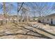 Large backyard with a privacy fence and mature trees at 106 Equestrian Ct, Summerville, SC 29486