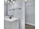 Bathroom features a modern vanity with a sink and a walk-in closet at 106 Equestrian Ct, Summerville, SC 29486