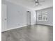 Bright bedroom with a ceiling fan, neutral walls, and a large window for natural light at 106 Equestrian Ct, Summerville, SC 29486