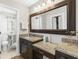 Bathroom with dual vanity sinks, granite countertops, and hardwood floors at 112 Blue Heron Dr, Summerville, SC 29485